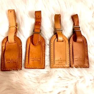 Lot of 4 small authentic Louis Vuitton luggage tags